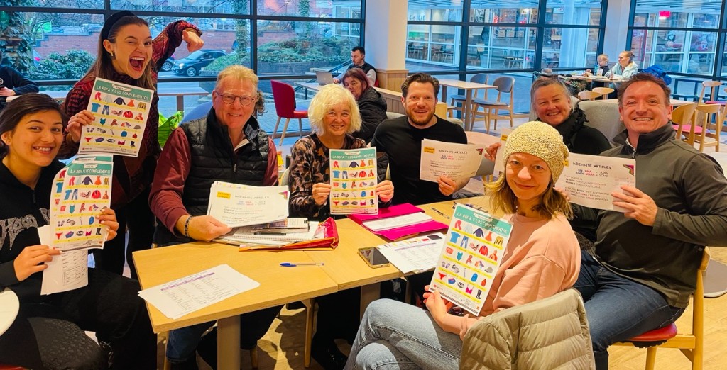In-person Spanish class with diverse adult learners